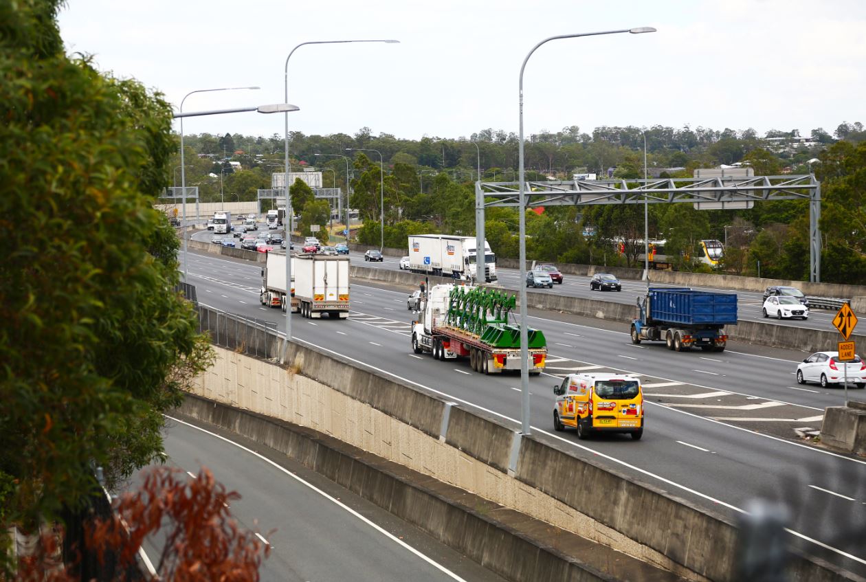 Trucks and cars on city freeway